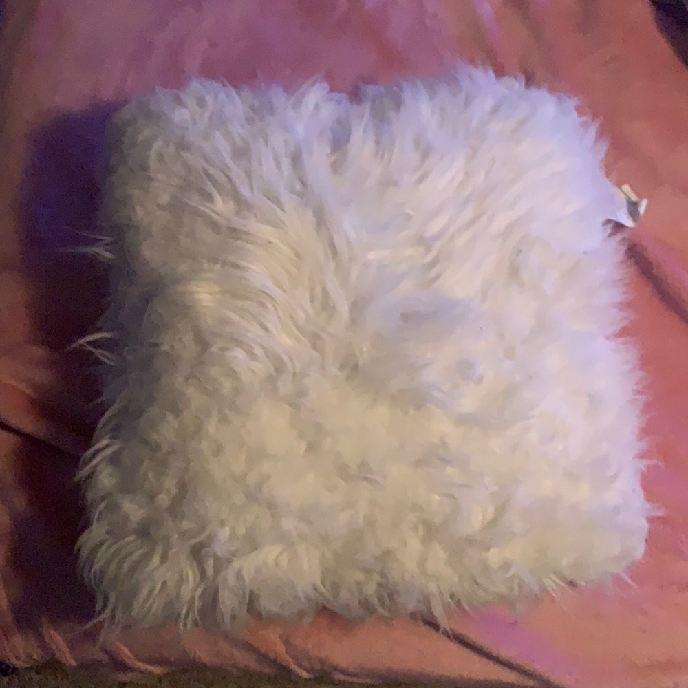 small white fluffy pillow for $8